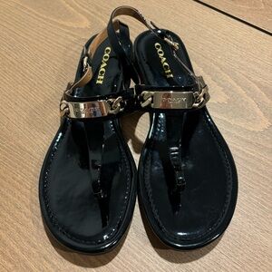 Coach black with gold accents sandals 9.5